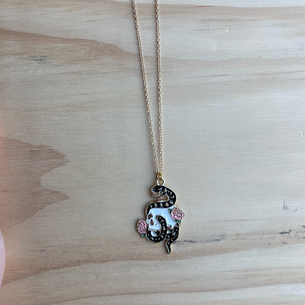 Elegant Gold and Black Snake Pendant Necklace